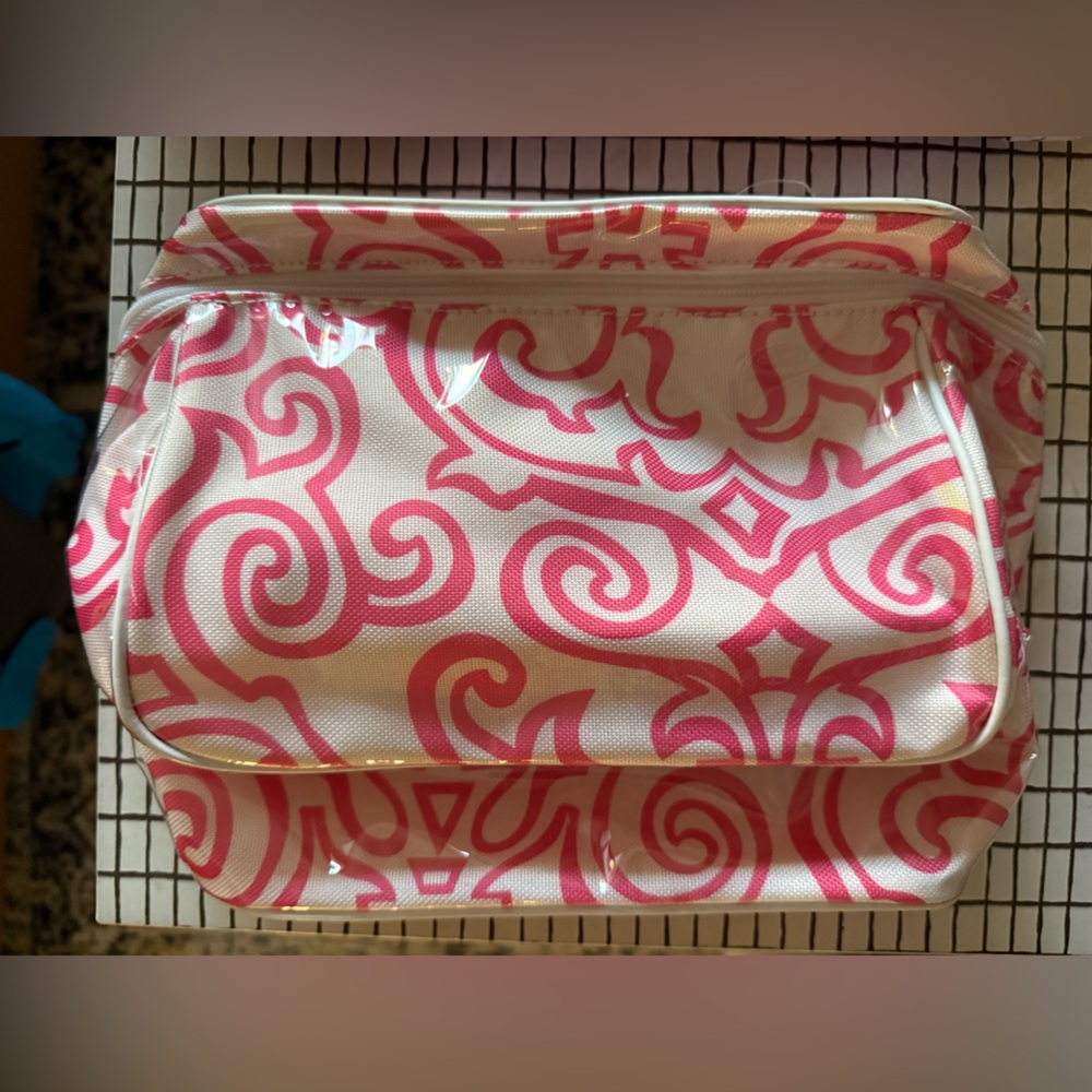 Clinique Pink and White Patterned Cosmetic Bag standing up bag
